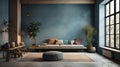 Modern cozy living room in blue and gray tones. Stylish comfortable sofa, round ottoman, concrete floor and vintage Royalty Free Stock Photo