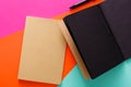 Modern creative work space with stylish black notepad Royalty Free Stock Photo