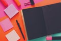 Modern creative work space with stylish black notepad Royalty Free Stock Photo