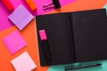 Modern creative work space with stylish black notepad Royalty Free Stock Photo