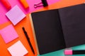 Modern creative work space with stylish black notepad Royalty Free Stock Photo