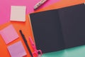 Modern creative work space with stylish black notepad Royalty Free Stock Photo