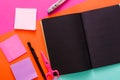 Modern creative work space with stylish black notepad Royalty Free Stock Photo