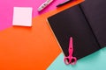 Modern creative work space with stylish black notepad Royalty Free Stock Photo