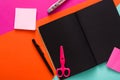 Modern creative work space with stylish black notepad Royalty Free Stock Photo