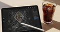 Digital Design Workspace: Tablet, Stylus, and Iced Coffee Royalty Free Stock Photo