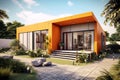 Modern cube orange house in summer with blue sky