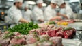 Modern culinary school kitchen where students practice meat preparation techniques Royalty Free Stock Photo