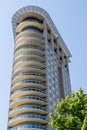 Modern Curved Condo Tower with Round Balconies Royalty Free Stock Photo