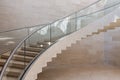 Modern curved staircase made form marble, steel and glass Royalty Free Stock Photo