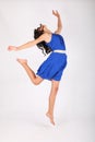 Modern dance of pretty teenage girl in blue dress Royalty Free Stock Photo
