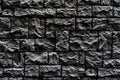 Modern dark brick wall. Pattern of decorative stone wall background. Surface black wall texture Royalty Free Stock Photo