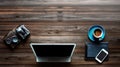 Modern dark wood office desk table with laptop, smartphone and other supplies with cup of coffee. coppy space for input the text