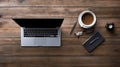 Modern dark wood office desk table with laptop, smartphone and other supplies with cup of coffee. coppy space for input the text Royalty Free Stock Photo