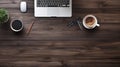 Modern dark wood office desk table with laptop, smartphone and other supplies with cup of coffee. coppy space for input the text Royalty Free Stock Photo