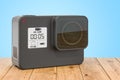 Modern dashcam DVR on the wooden planks, 3D rendering