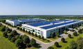 Modern data center campus with white buildings and solar panels surrounded by trees and sunny roads Royalty Free Stock Photo