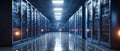 Modern data center hallway with server racks and bright overhead lighting Royalty Free Stock Photo