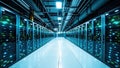 Modern data center server racks lined up in a long corridor perspective view Royalty Free Stock Photo