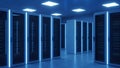 Data Center Server Room with Blue Neon Lights - Technology and Cloud Computing Concept Royalty Free Stock Photo