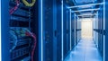 Modern data center server room with illuminated racks and networking equipment Royalty Free Stock Photo