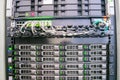 Modern database servers are connected to the switch in the server room rack. Hosting of popular portals is in the data center. The Royalty Free Stock Photo