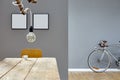 Modern decoration in vintage loft branch lamp table and silver bike