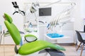 Dental office with green chair Royalty Free Stock Photo