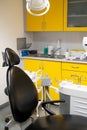 Modern dentist office with black chair