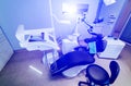 Modern dentistry office interior with chair and tools. Microscope in stomatology.