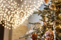 Modern design Christmas tree decorated with balls, toys and garlands. Christmas or New Year background. Royalty Free Stock Photo