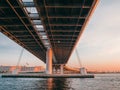 Modern design concrete bridge support over water. The highway over the head