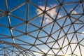 Modern design curved steel frame structure under a blue sky Royalty Free Stock Photo