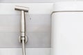 Spray cleaning flush toilet Royalty Free Stock Photo