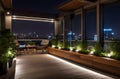 Modern design of rooftop patio with night lights. City view. Beautiful landscape at night. Financial city downtown, real estate Royalty Free Stock Photo