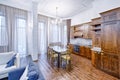 Modern design white kitchen in a spacious apartment. Royalty Free Stock Photo