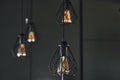 Modern designed light bulbs hangs on the wall indoors. Decoration and domestic life