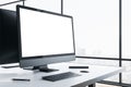 Modern designer desktop with empty white computer screen