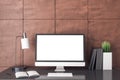 Modern designer workplace with blank computer screen