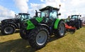 Modern Deutz - Fahr Tractor Parked on grass. Royalty Free Stock Photo