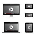 Modern digital devices with web video player on screen Royalty Free Stock Photo