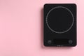 Modern digital kitchen scale on pink background, top view. Space for text Royalty Free Stock Photo