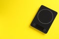 Modern digital kitchen scale on yellow background, top view. Space for text Royalty Free Stock Photo