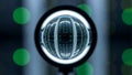 Modern Digital Server Racks Reflected in Sphere with Bright Green Lights and Bokeh Royalty Free Stock Photo