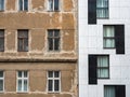 Modern and Dilapidated Abandoned House Side by Side