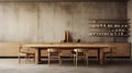 Modern dining area spacious kitchen with large wooden table against sleek concrete wall Royalty Free Stock Photo