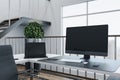 Modern director`s workspace with laptop and computer monitor with blank screen Royalty Free Stock Photo