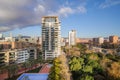 Modern district of Barcelona, view to the public park and residental area with swimming pool. Catalonia, Spain