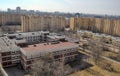 Modern district with standard panel houses and school