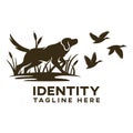 Modern dog hunting for ducks logo. Royalty Free Stock Photo